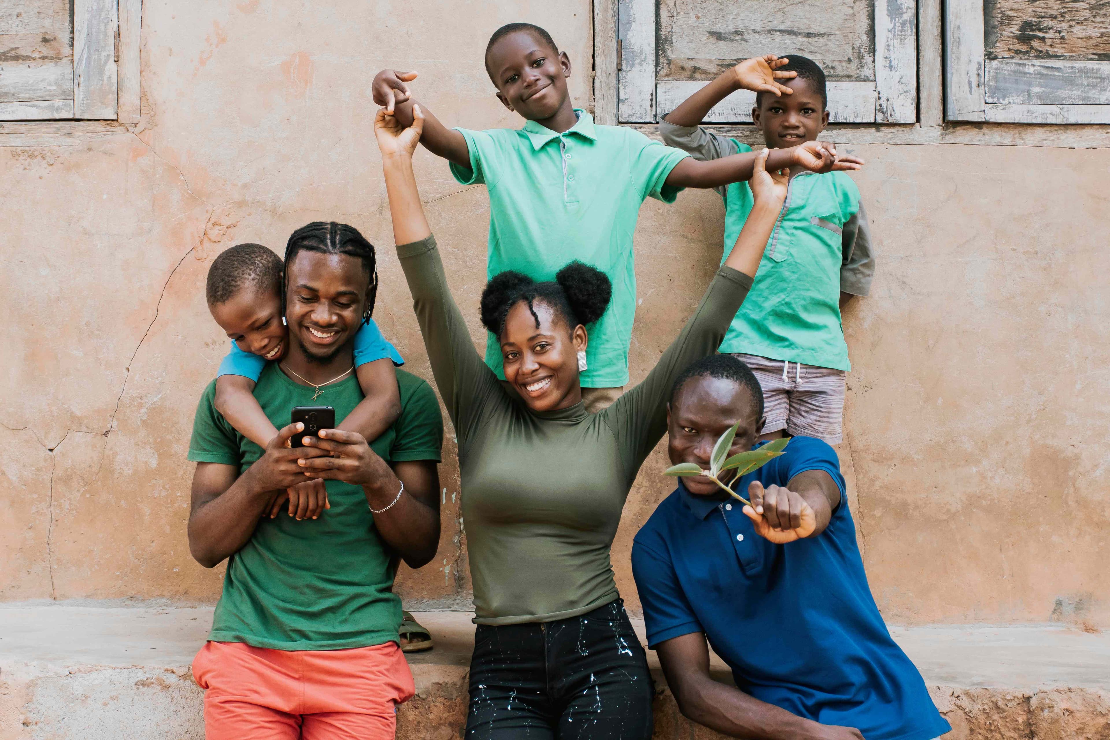 Smiling African youth standing together